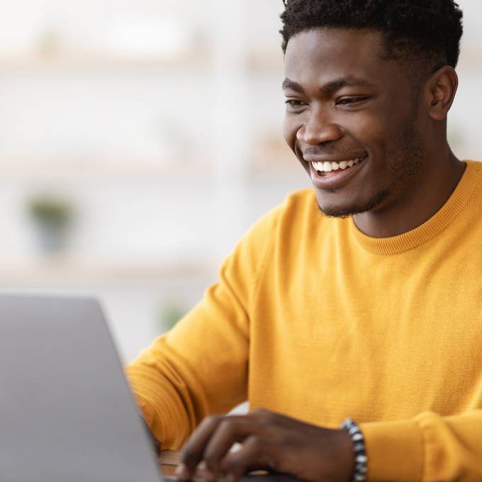 afro-man-on-a-laptop